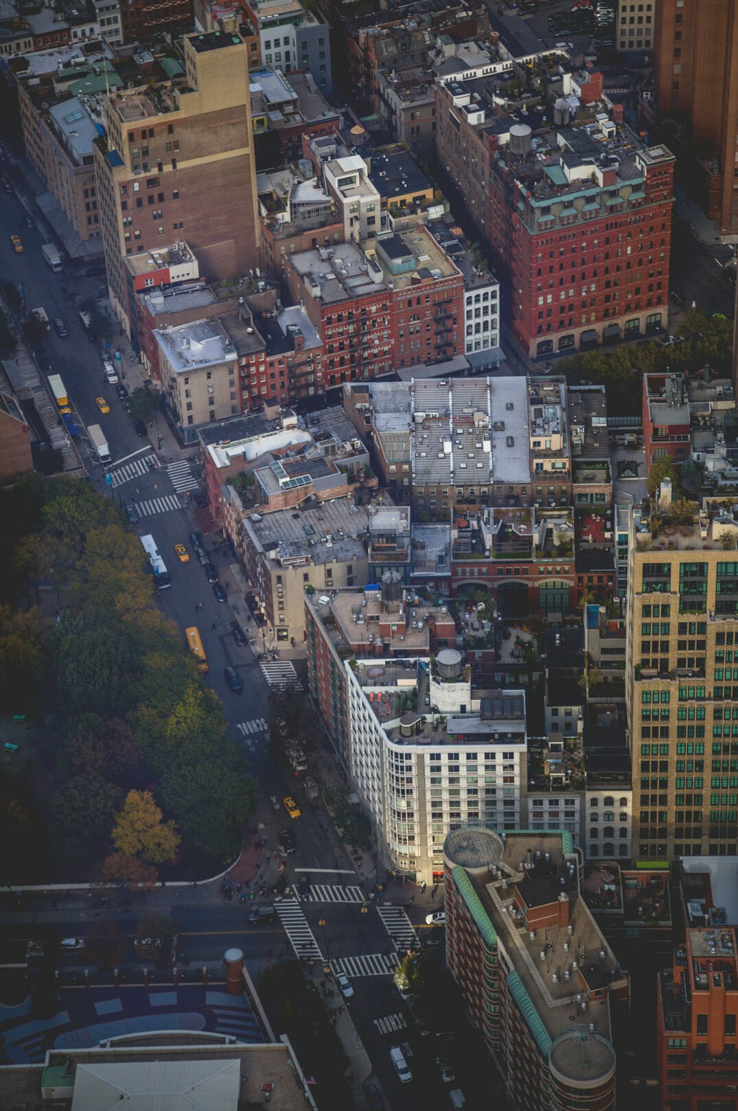 City street with buildings seen from above at dusk